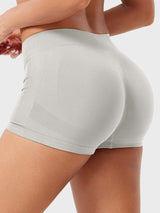 DICORYA — Mini short de sport taille basse